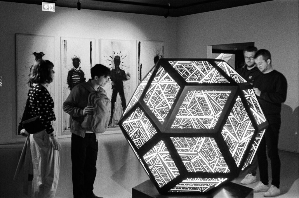 Visitors at MOCO interacting with exhibit